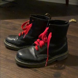 black combat boots with red laces
